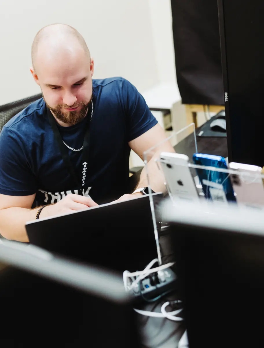 QA engineer working with testing equipment