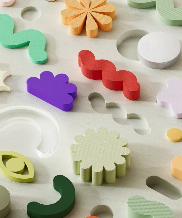 Colorful abstract 3D shapes representing diverse AI model components being tested