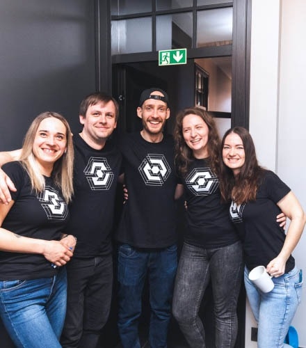 A group photo with a bunch of people.