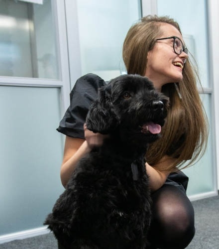 A person with a dog.