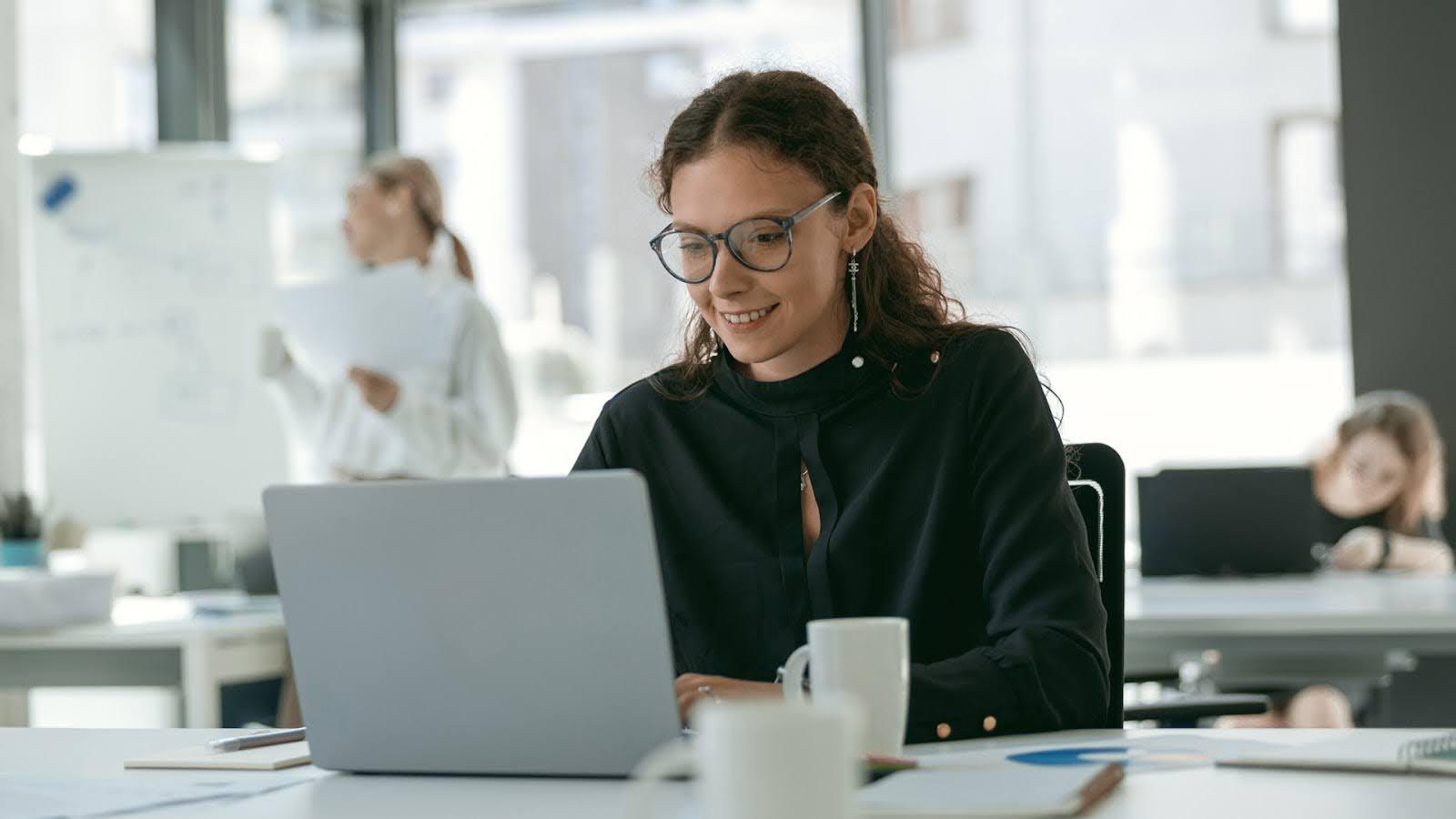Woman is working at her computer