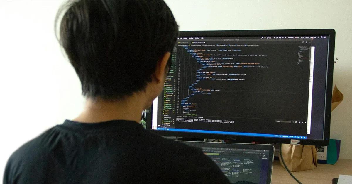 Man looking at a computer screen.