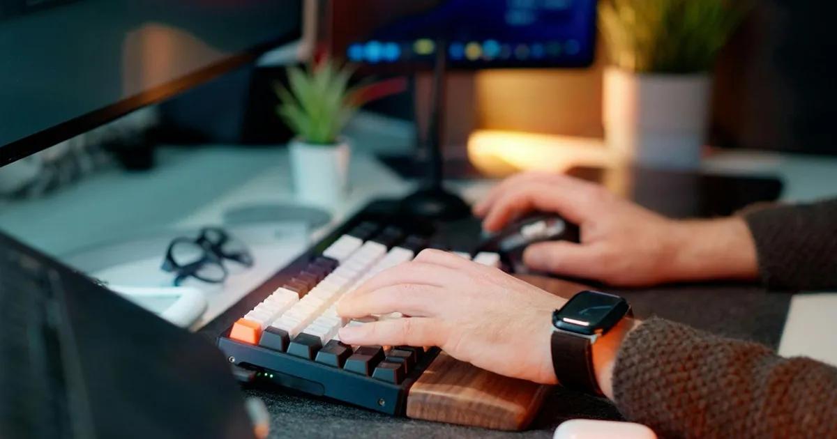 QA engineer typing on keyboard