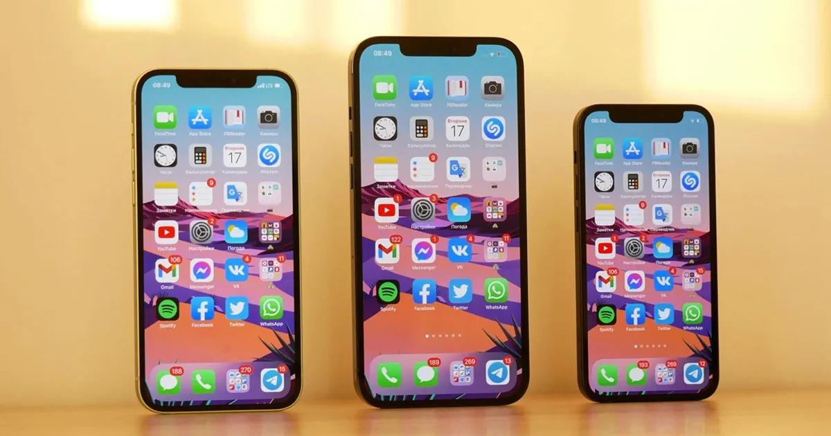 Three different iPhones with screens unlocked and same apps displayed