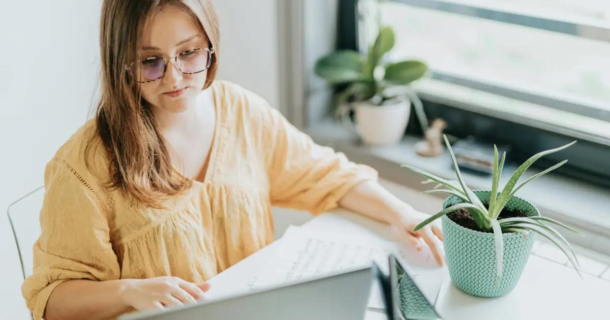 Woman works in an office.