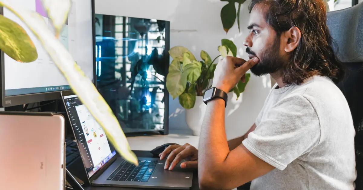 Man looking at a computer screen.
