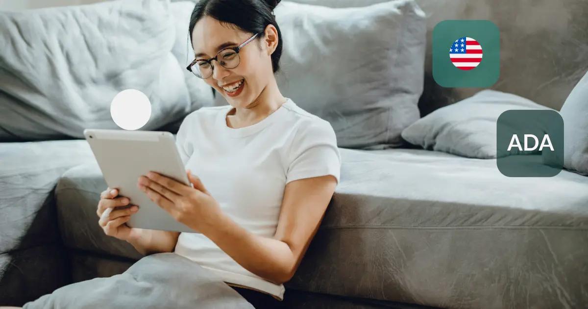 Woman holding a tablet.