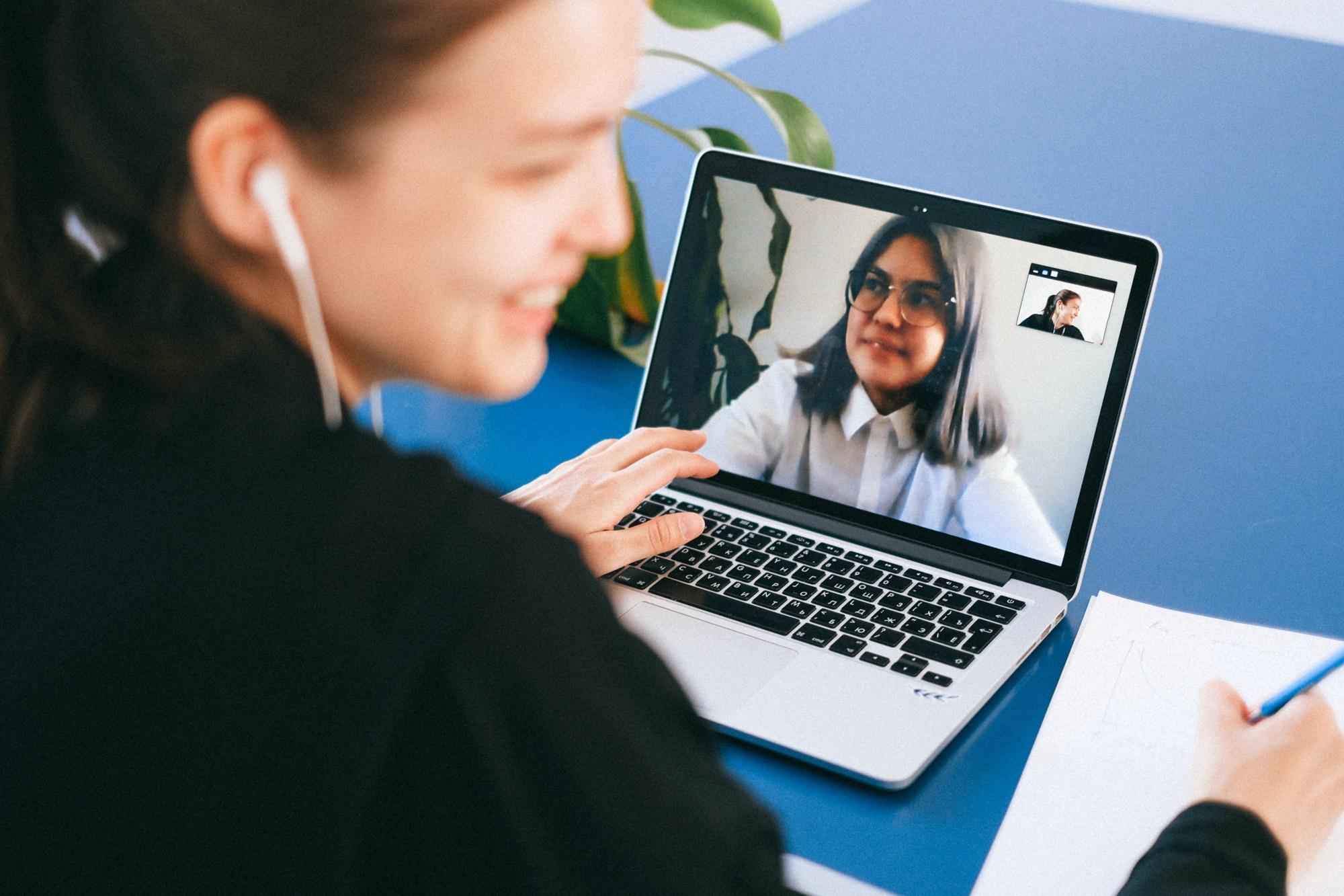 Two people on a video call using a video conferencing app
